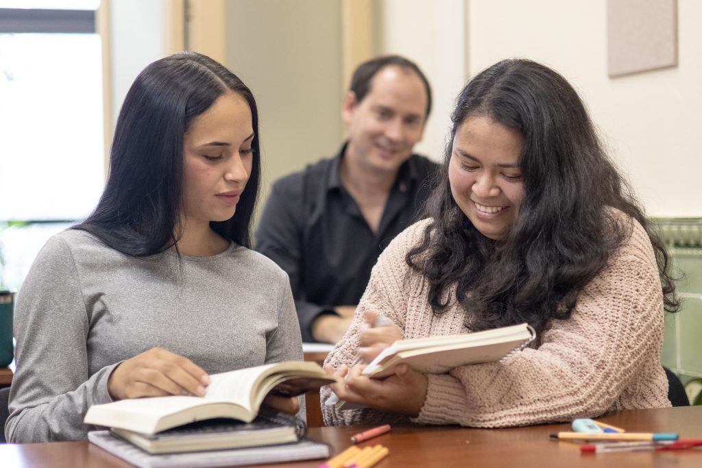 Students collaborating in a classroom setting in Montevideo, Uruguay.